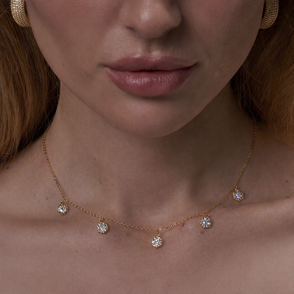Gold necklace with blue stones